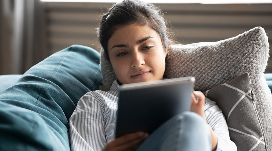 Girl using her tablet on LTE-A